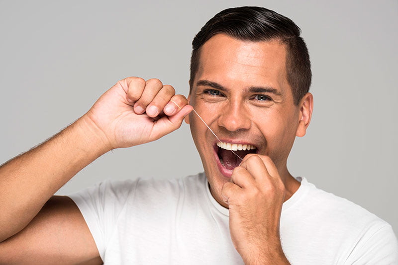 aprende a usar hilo dental | Clínica Dental Parque